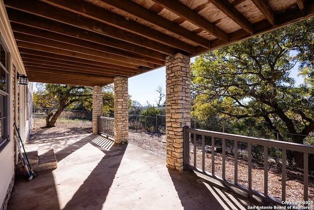 view of patio with fence