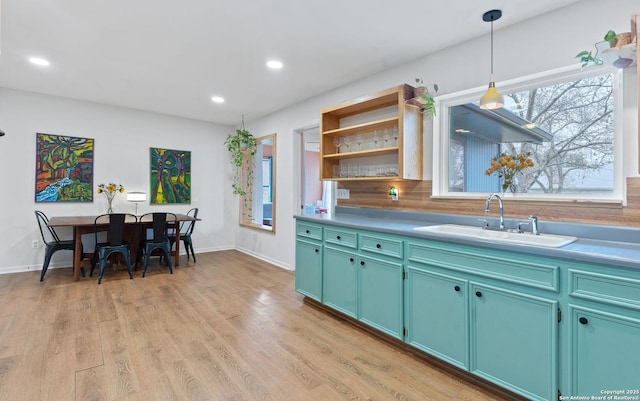 kitchen with open shelves, a sink, recessed lighting, and a healthy amount of sunlight