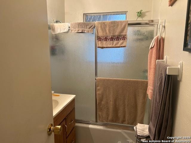 404 W Polk, Sabinal, TX 78881 - full bathroom with bath / shower combo with glass door and vanity