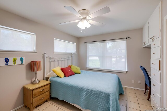 706 Gloria, Seguin, TX 78155 - bedroom with a ceiling fan, baseboards, and light tile patterned floors