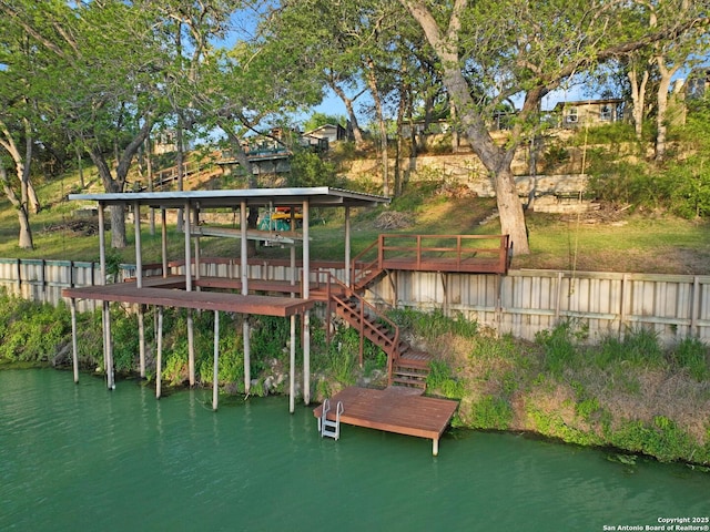 706 Gloria, Seguin, TX 78155 - view of jungle gym with a boat dock and a water view