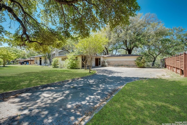 706 Gloria, Seguin, TX 78155 - view of front of property featuring driveway and a front yard