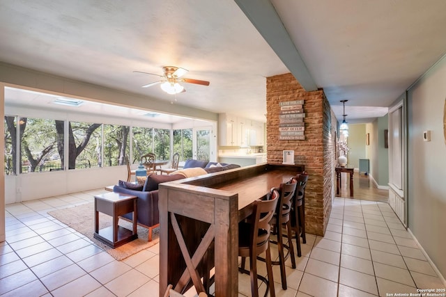 706 Gloria, Seguin, TX 78155 - interior space with a ceiling fan, light tile patterned floors, and a healthy amount of sunlight