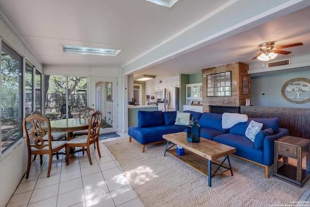 706 Gloria, Seguin, TX 78155 - living room featuring ceiling fan, light tile patterned flooring, and visible vents