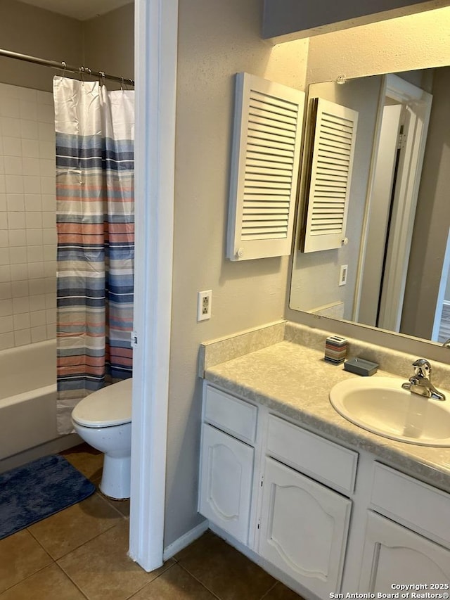 bathroom with shower / bath combo, tile patterned flooring, vanity, and toilet