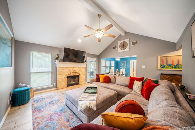 170 Pullman Rd, La Vernia, TX 78121 - living room with a fireplace, visible vents, lofted ceiling with beams, and ceiling fan