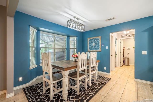 170 Pullman Rd, La Vernia, TX 78121 - tiled dining area with visible vents and baseboards
