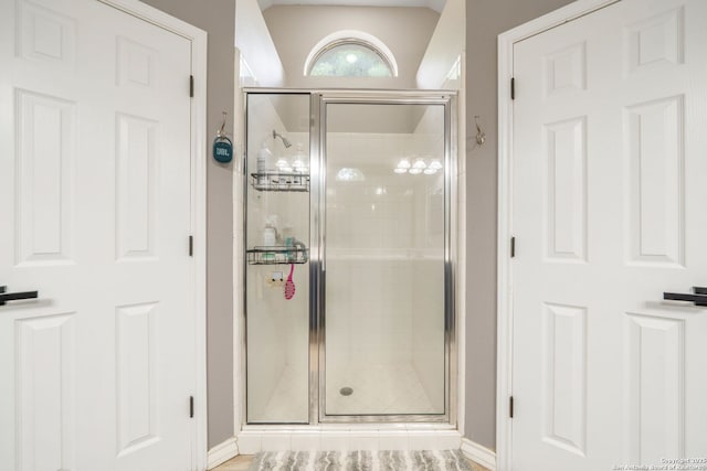 170 Pullman Rd, La Vernia, TX 78121 - bathroom featuring baseboards and a stall shower