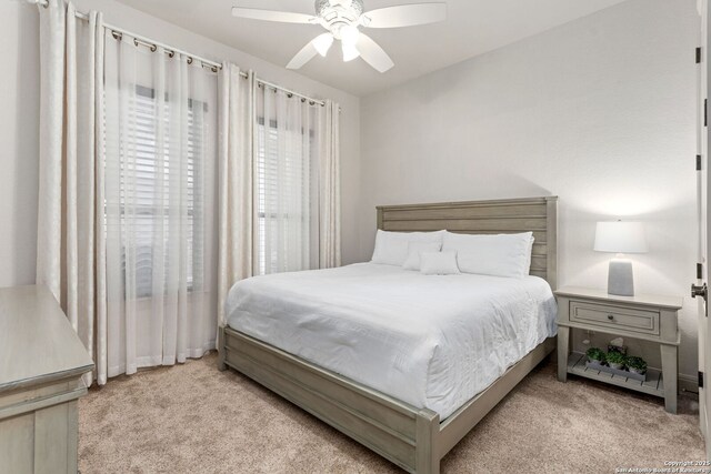 bedroom with carpet floors and ceiling fan
