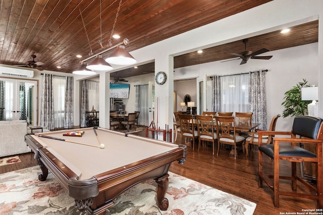 playroom featuring a wall mounted air conditioner, wood finished floors, wooden ceiling, and ceiling fan