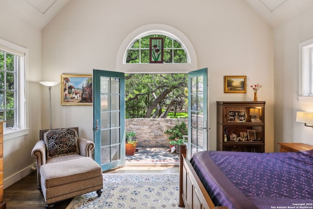 110 Turnberry Way, San Antonio, TX 78230 - bedroom with wood finished floors, access to exterior, and high vaulted ceiling