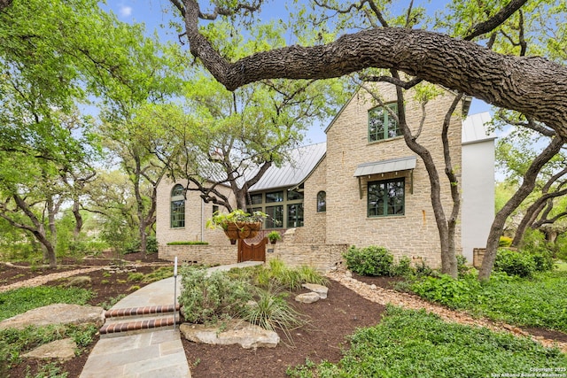110 Turnberry Way, San Antonio, TX 78230 - tudor-style house with a standing seam roof and metal roof