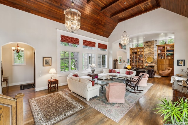 110 Turnberry Way, San Antonio, TX 78230 - living room with a chandelier, arched walkways, wooden ceiling, high vaulted ceiling, and wood finished floors