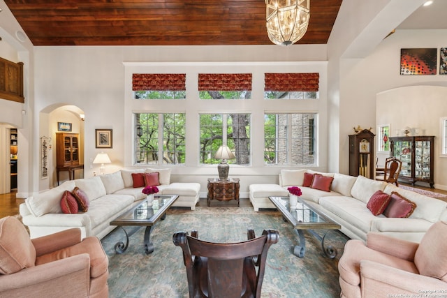 110 Turnberry Way, San Antonio, TX 78230 - living area with wood ceiling, arched walkways, a chandelier, and high vaulted ceiling