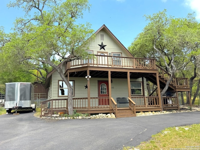 209 Lake Frst, Canyon Lake, TX 78133 - view of front facade with a deck and stairs