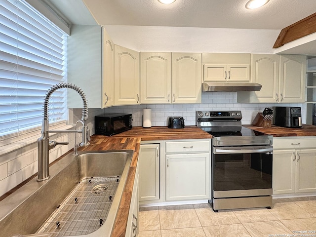 209 Lake Frst, Canyon Lake, TX 78133 - kitchen with a sink, stainless steel electric stove, black microwave, and wooden counters