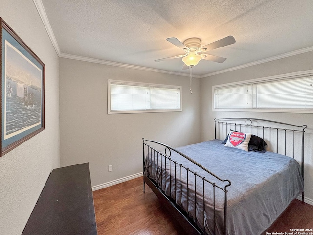 209 Lake Frst, Canyon Lake, TX 78133 - bedroom featuring baseboards, ornamental molding, wood finished floors, and a textured ceiling