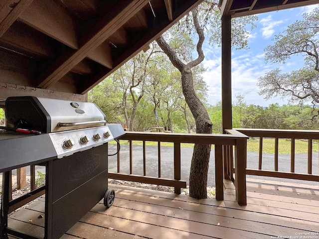 209 Lake Frst, Canyon Lake, TX 78133 - wooden deck with a grill and a water view