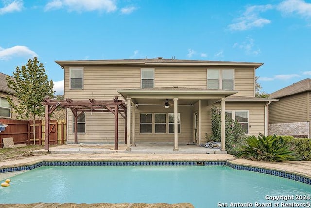 view of pool with a pergola, a fenced in pool, a patio, and ceiling fan