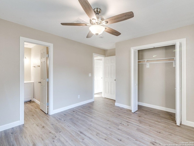 unfurnished bedroom with ceiling fan, baseboards, light wood-style floors, and a closet