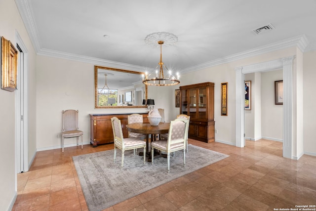 dining area featuring baseboards, visible vents, an inviting chandelier, and ornamental molding