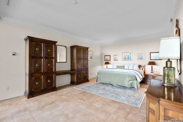 bedroom featuring baseboards and ornamental molding