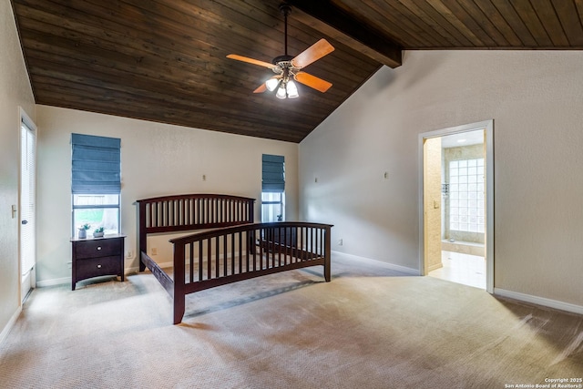 unfurnished bedroom featuring vaulted ceiling with beams, baseboards, carpet, and wooden ceiling
