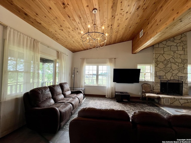 living room with a wealth of natural light, vaulted ceiling, wooden ceiling, and an inviting chandelier