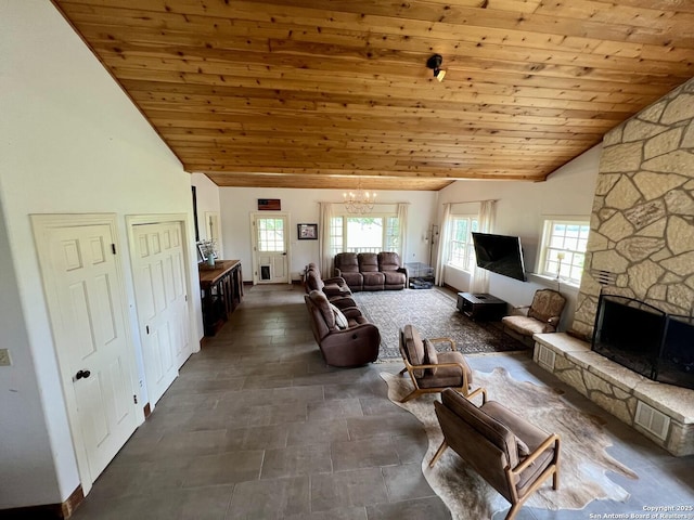 living room featuring a wealth of natural light, wooden ceiling, and an inviting chandelier