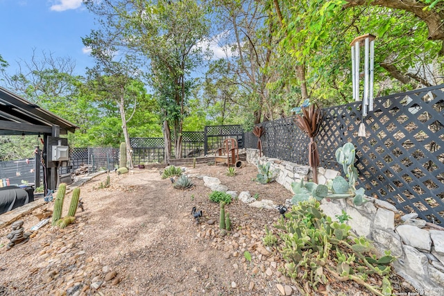 view of yard featuring a fenced backyard