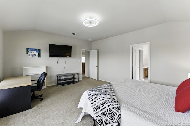 carpeted bedroom featuring lofted ceiling and visible vents