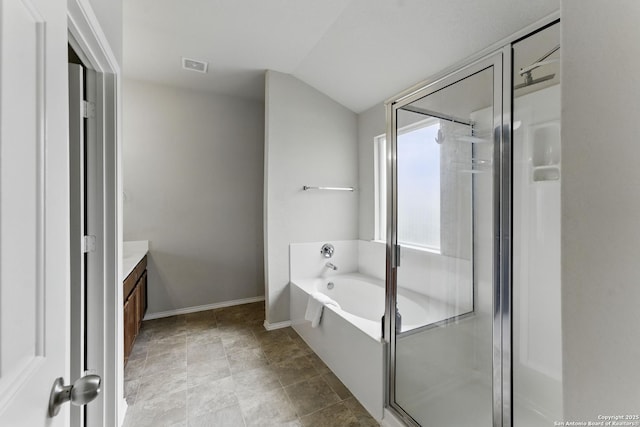 full bathroom with a shower stall, visible vents, a garden tub, and vanity