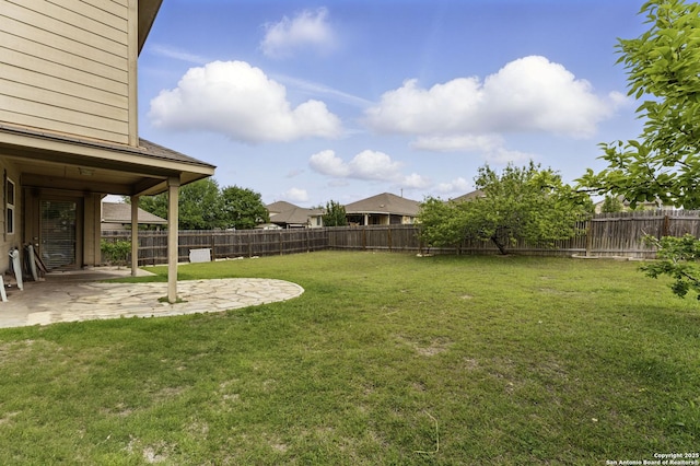 view of yard featuring a fenced backyard and a patio area