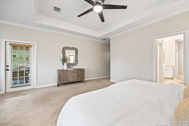carpeted bedroom with crown molding, a raised ceiling, baseboards, access to outside, and visible vents