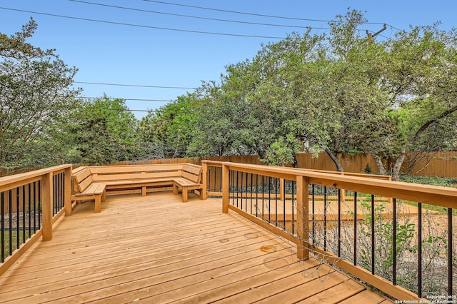 deck featuring a fenced backyard