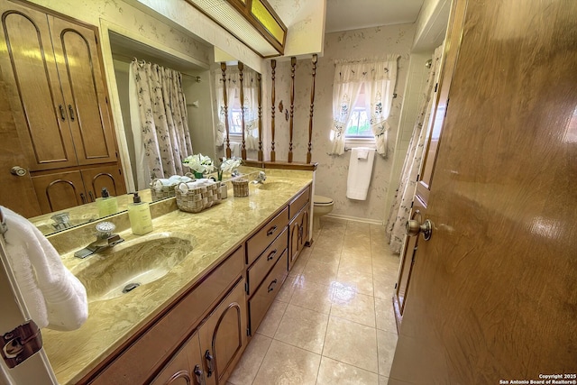207 Mary Louise Dr, San Antonio, TX 78201 - bathroom with toilet, tile patterned floors, a sink, and double vanity