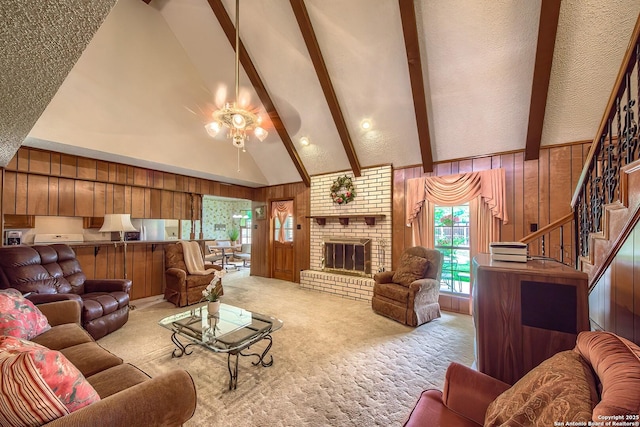 207 Mary Louise Dr, San Antonio, TX 78201 - living area with stairway, wood walls, a ceiling fan, beamed ceiling, and light colored carpet
