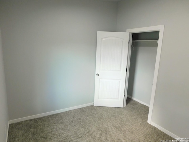 6023 Lark Valley Dr, San Antonio, TX 78242 - unfurnished bedroom with carpet floors, a closet, and baseboards