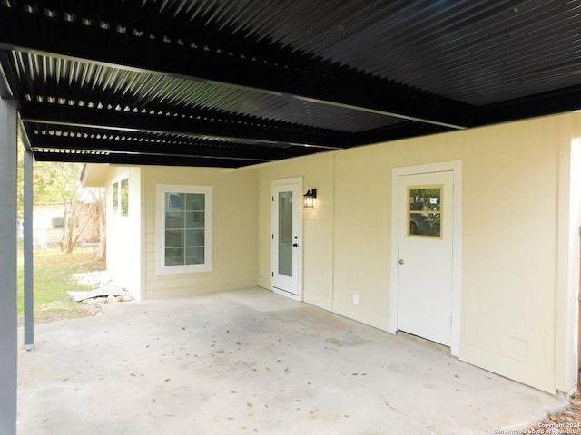 6023 Lark Valley Dr, San Antonio, TX 78242 - view of patio / terrace featuring a carport