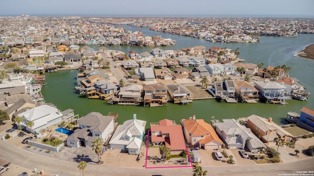 bird's eye view featuring a residential view and a water view