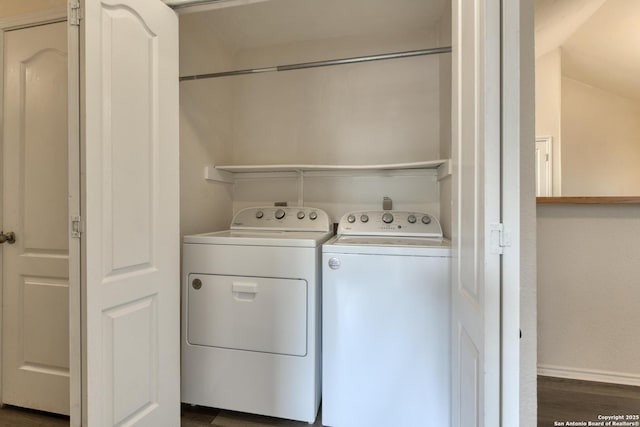 laundry room with separate washer and dryer, baseboards, laundry area, and dark wood-style flooring