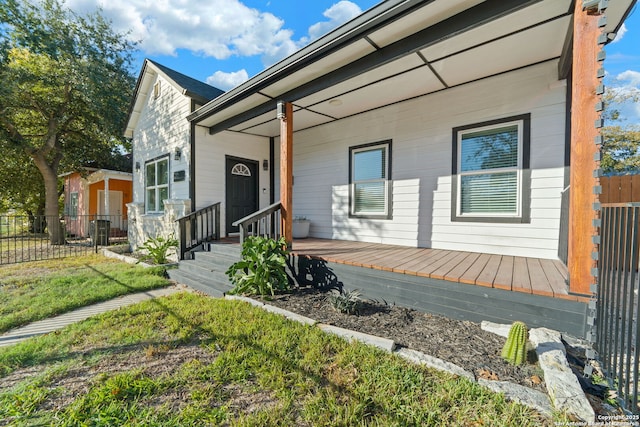 view of front of home with fence