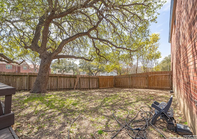 view of yard featuring a fenced backyard