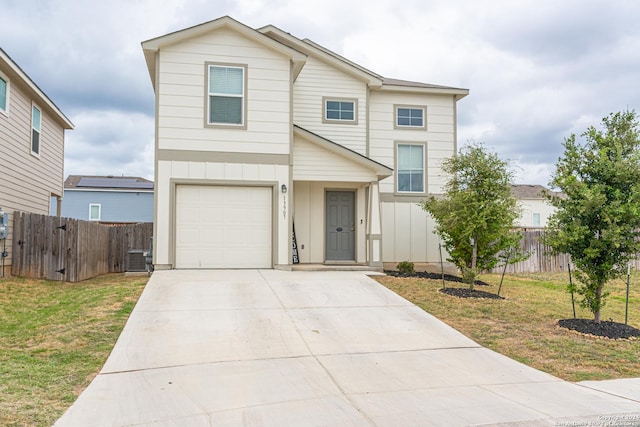 13907 Cyprus Sedge, San Antonio, TX 78254 - traditional-style home featuring driveway, fence, a garage, board and batten siding, and a front yard