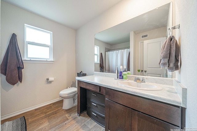 13907 Cyprus Sedge, San Antonio, TX 78254 - full bathroom featuring a wealth of natural light, toilet, wood finished floors, and visible vents