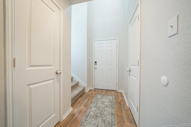 13907 Cyprus Sedge, San Antonio, TX 78254 - entryway with baseboards and wood finished floors