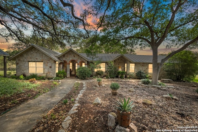 2802 State Highway 46, New Braunfels, TX 78132 - view of front facade featuring stone siding, metal roof, and a standing seam roof