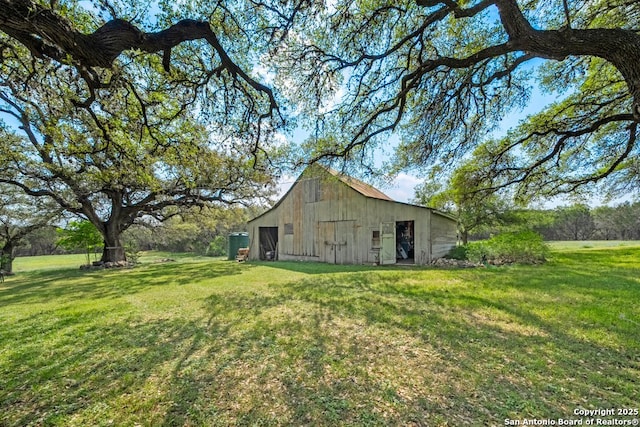 2802 State Highway 46, New Braunfels, TX 78132 - view of home's exterior featuring a yard, a detached garage, and an outdoor structure
