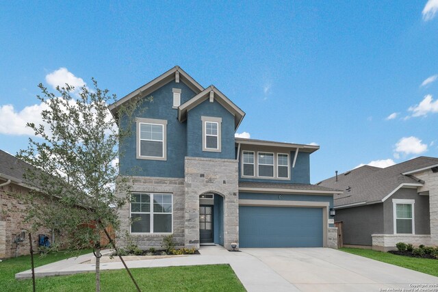 2618 Suncadia Ln, San Antonio, TX 78245 - view of front of property with a front lawn, concrete driveway, stucco siding, stone siding, and a garage