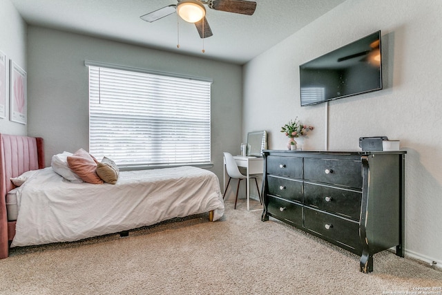 bedroom featuring carpet and ceiling fan
